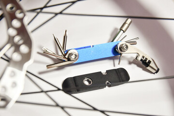 Multitool for bicycle tightening spokes and hexagons
