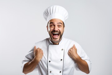 Happy male chef on white background.