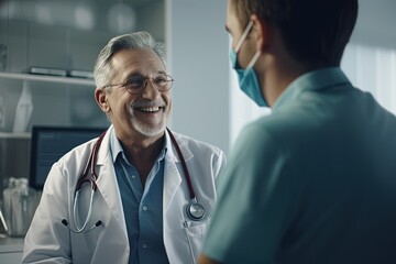 Happy senior doctor, dressed in medical mask.