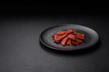 Delicious dried veal or turkey jerky with salt, spices and herbs