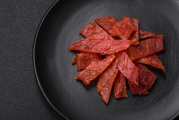 Delicious dried veal or turkey jerky with salt, spices and herbs