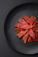 Delicious dried veal or turkey jerky with salt, spices and herbs
