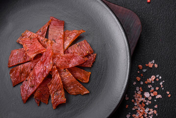 Delicious dried veal or turkey jerky with salt, spices and herbs
