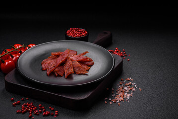 Delicious dried veal or turkey jerky with salt, spices and herbs
