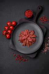 Delicious dried veal or turkey jerky with salt, spices and herbs