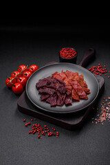 Delicious dried veal or turkey jerky with salt, spices and herbs