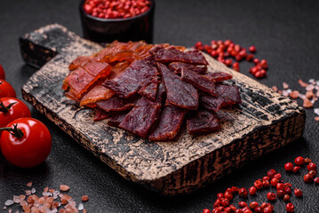 Delicious dried veal or turkey jerky with salt, spices and herbs