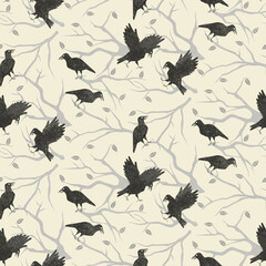 Stamped effect of black ravens and crows on grey branches on a cream background