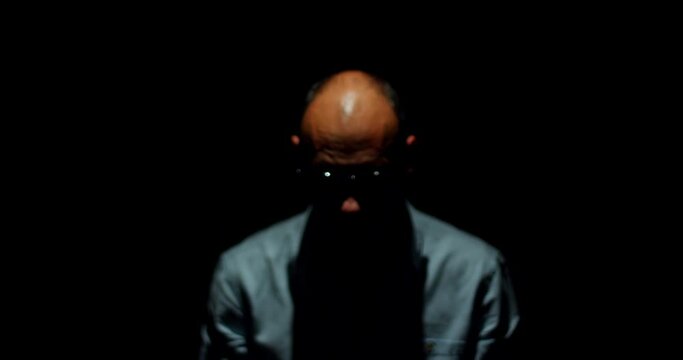 Captive Elegance. A Glimpse into the Despondency, Hopelessness, and Enigmatic Innocence of a Shackled Man in Corporate Attire.