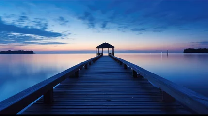  Wooden bridge over the sea on blue hour. © visoot