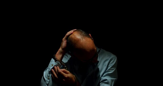 The Descent into Madness. A Desolate Figure Screaming and Unraveling in the Depths of Darkness. In the midst of darkness, a despondent man sits, driven to the brink of madness by internal struggles. 