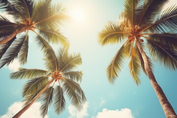 Fototapeta na wymiar Vintage Tropical Reverie: Gazing Up at Palm Trees against a Blue Sky, Evoking Summer Vibes on a Serene Beach
