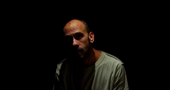 Guilty sad man. A Glimpse into the Despondency, Hopelessness, and Enigmatic Innocence of a Shackled Man in Corporate Attire.