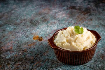 Mashed potato in the bowl. Potato puree.