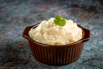 Mashed potato in the bowl. Potato puree.