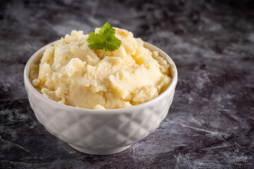 Mashed potato in the bowl. Potato puree.