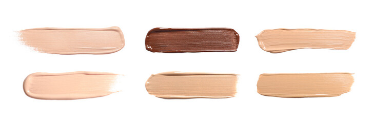 Set of foundation samples in different tones on white background