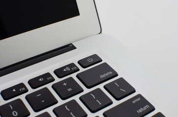 Stunning details of laptop keys and keyboard in a zoom that reveals its quality.