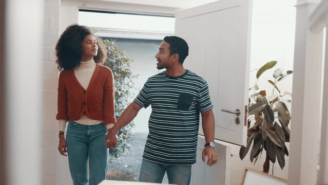 Real estate, door and couple holding hands, moving or new home, property or relocation success. Mortgage, start and homeowner people happy in dream house, investment and apartment or walking together