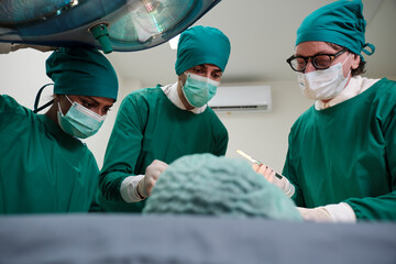 Specialist surgeons teams, professional doctor with assistants, surgery operations on critically...