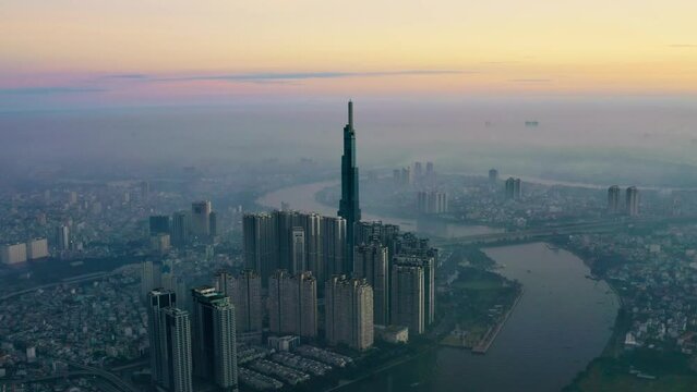 Drone view Hyperlapse Landmark 81 in sunrise, Ho Chi Minh city, South Vietnam