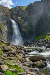 Naklejka na ściany i meble Kurkure waterfall in Altai in summer 