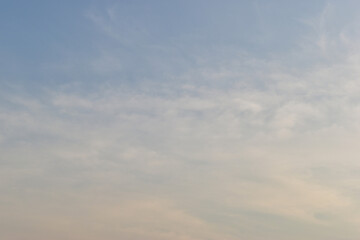 beautiful blue sky and cloud with golden ray sunrise in the morning, natural background