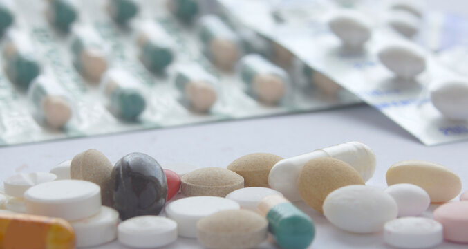 Several medicine pills in full screen. 