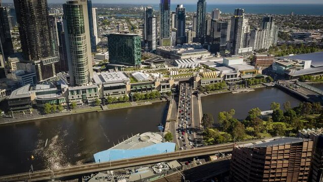 Melbourne Crown over River timelapse from Rialto towers level 30 Melbourne South bank peak hour traffic nice sunny day Albert Park in the distance high rise buildings