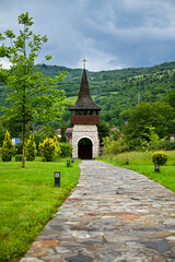 Fototapeta na wymiar Turm in der Mauer des Holy Cross Monastery, Mănăstirea Lupșa Monastery near Mănăstirea in Romania