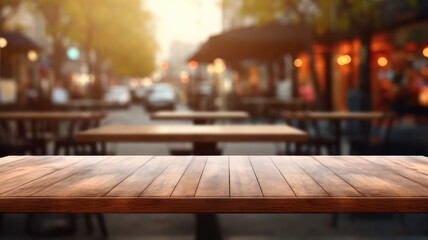 Empty wooden table with cafe kitchen background