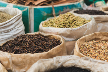 Variety of Herbs and Spices in sacks display