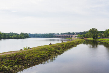 Tranquil Waterway at Canal's Terminus Amidst Nature's Beauty