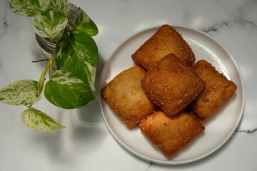 Odading or Galundeng is a traditional sweet made from flour and sugar and process in deep fried. Indonesian food. 