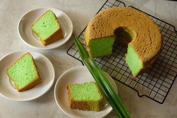 Bolu Pandan or Pandan sponge cake or chiffon cake. Pandanus leaf cake. Indonesian food, Malaysian...