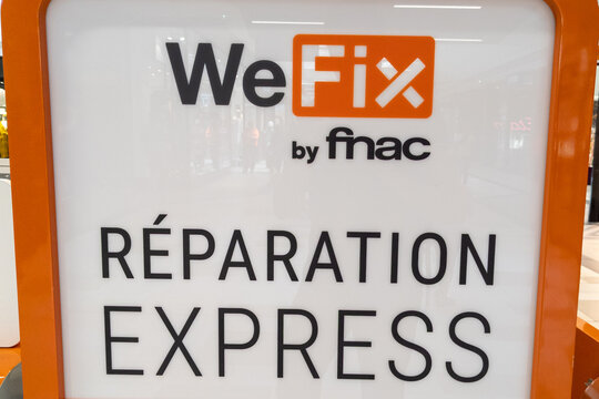 wefix Fnac shop logo brand and text sign front we fix facade of store electronic cell phone repair fast repair retail
