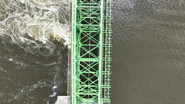 Top down view of a bridge and loch system.