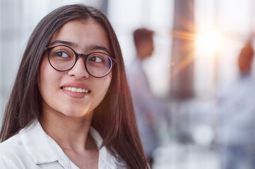 Young student or teacher looking at camera