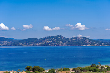 Fototapeta na wymiar Aerial view from Giens peninsula on a sunny spring day with Mediterranean Sea and mountain panorama in the background. Photo taken June 8th, 2023, Giens, Hyères, France.