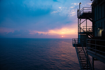 Sunset view from a oil rig