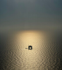 Silhouette of a oil rig in the Gulf of Mexico
