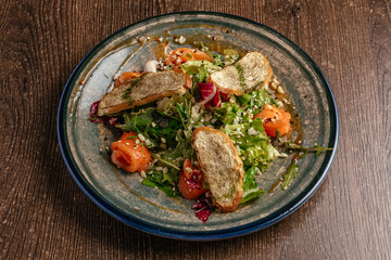 salad with salmon and croutons