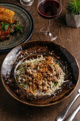 finnish gnocchi with meat and cheese on a plate