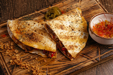 tacos with beef, sauce and vegetables