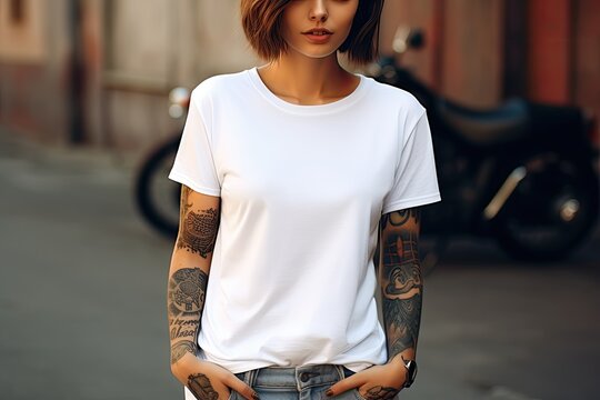 young girl with tattoos wearing a white mockup t-shirt (Generative AI)
