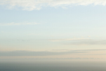 Fototapeta na wymiar Calm sunset over the Pacific ocean in Big Sur, CA.