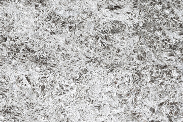 Texture of crumpled silver aluminum