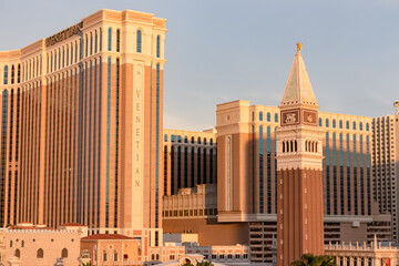 Panoramic sunset view of replica Saint Mark bell tower of luxury hotel and casino resort Venetian on the Las Vegas Strip, Nevada, USA. Gambling, party, freedom and no limits concept. Sin city