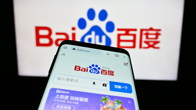 Stuttgart, Germany - 08-15-2023: Smartphone with website of Chinese technology company Baidu Inc. on screen in front of business logo. Focus on top-left of phone display.
