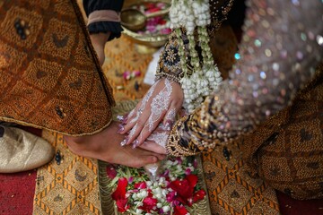 Injak Telur in Indonesia Javanese Traditional Wedding 